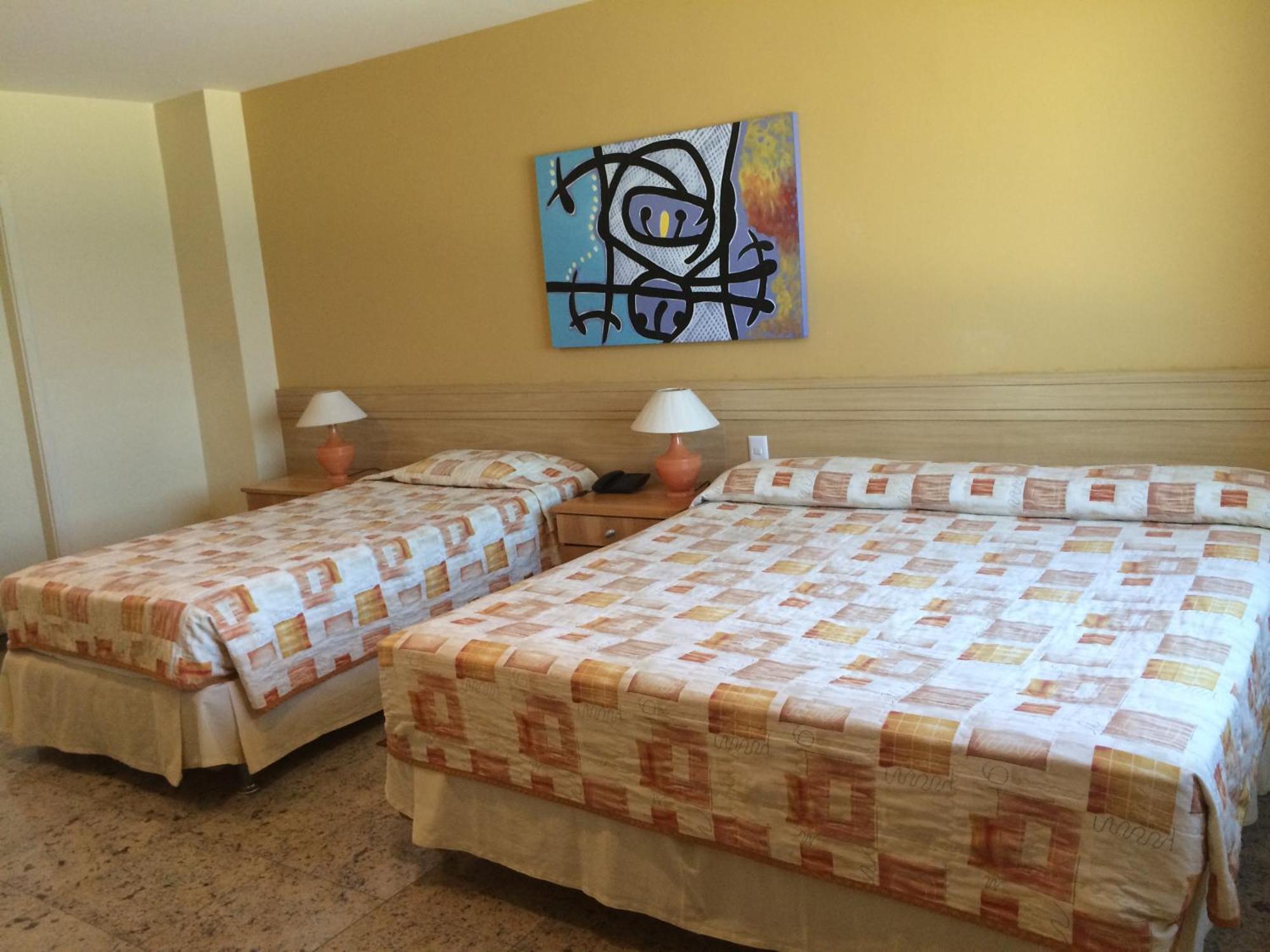 Quarto Familiar com Vista Mar